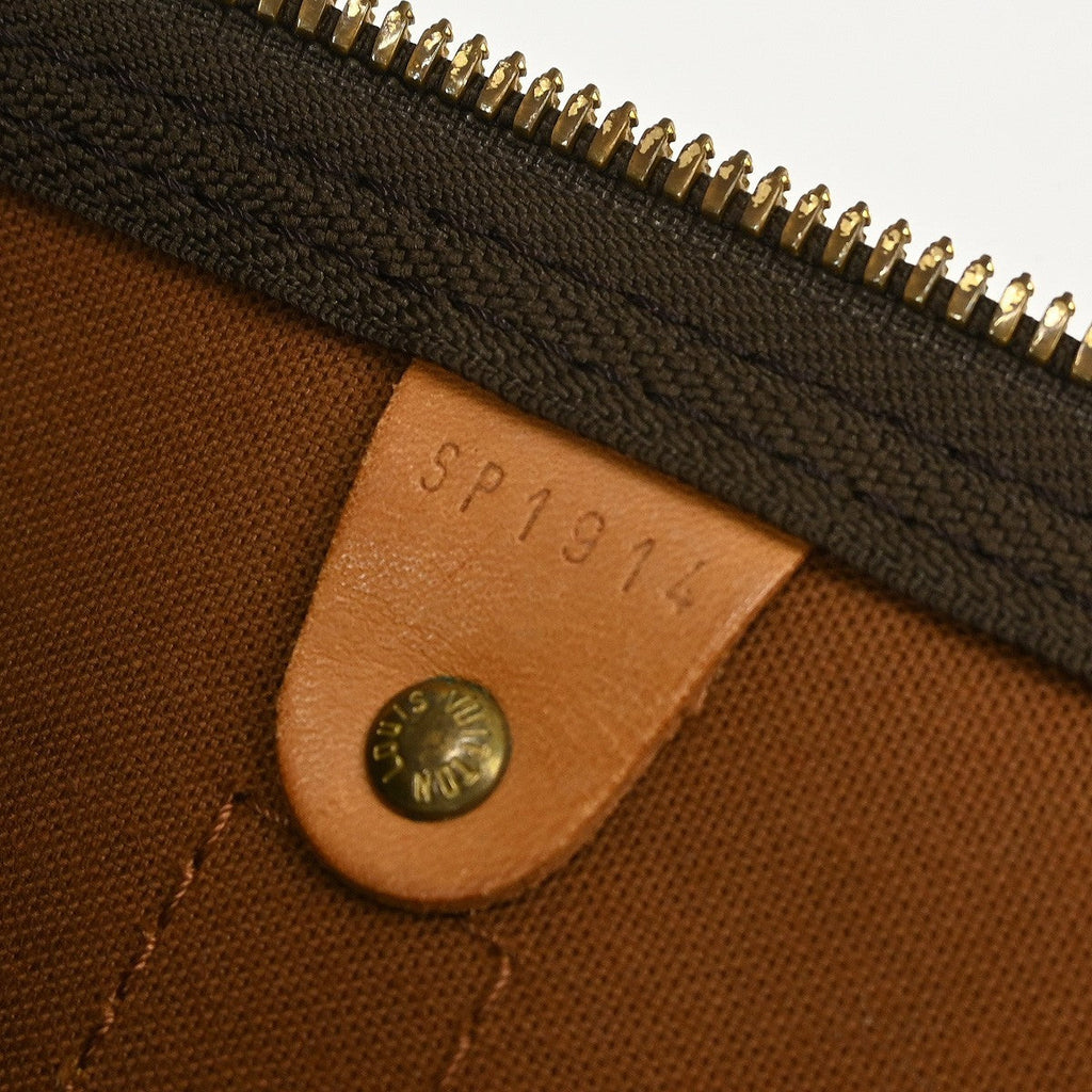 Louis Vuitton Keepall Bag Monogram Canvas Brown Canvas Travel Bag Bag (Pre-Owned)