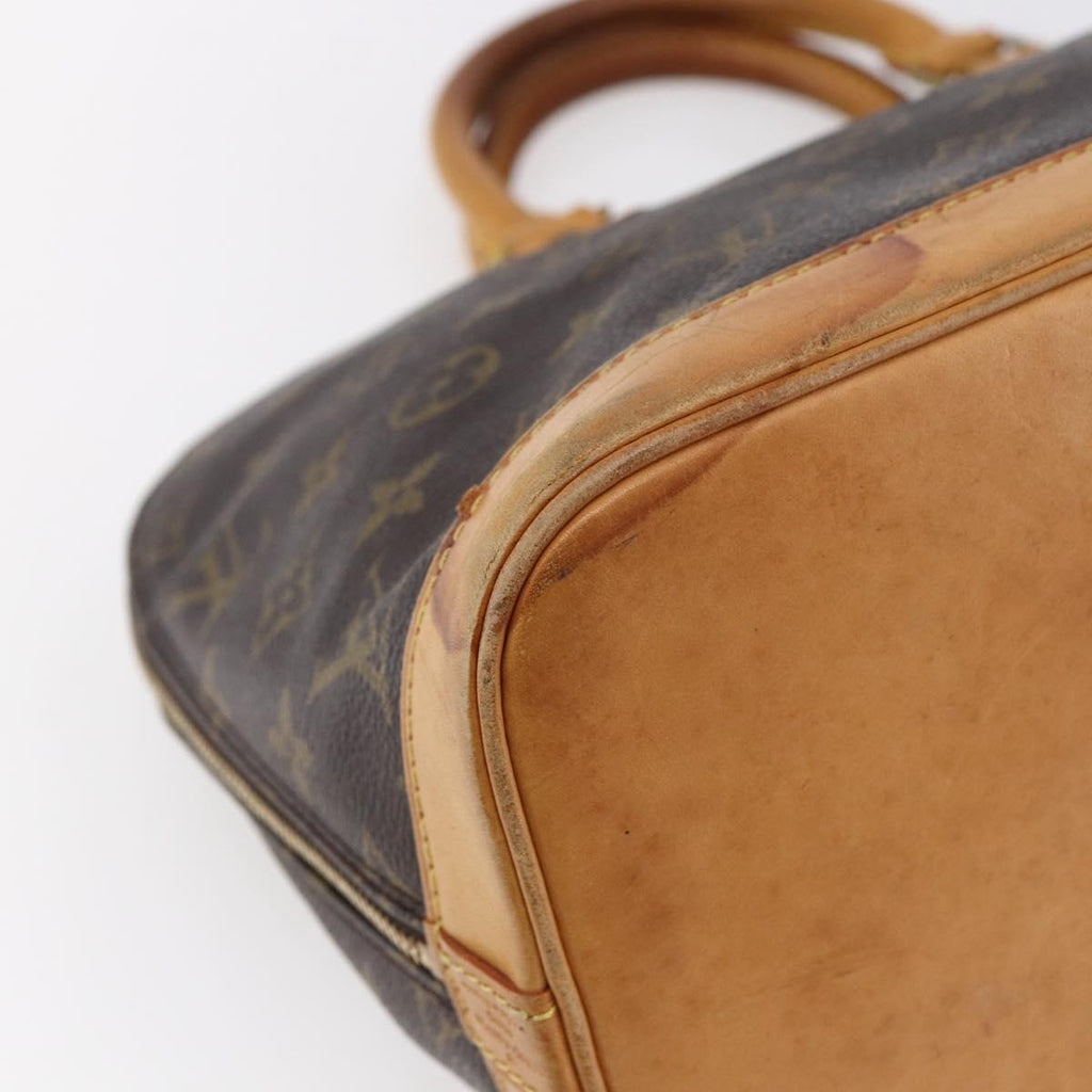 Louis Vuitton Alma Handbag Monogram Canvas Brown Canvas Handbag (Pre-Owned)