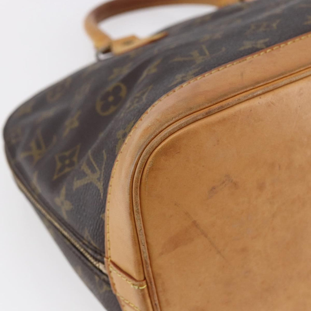 Louis Vuitton Alma Handbag Monogram Canvas Brown Canvas Handbag (Pre-Owned)