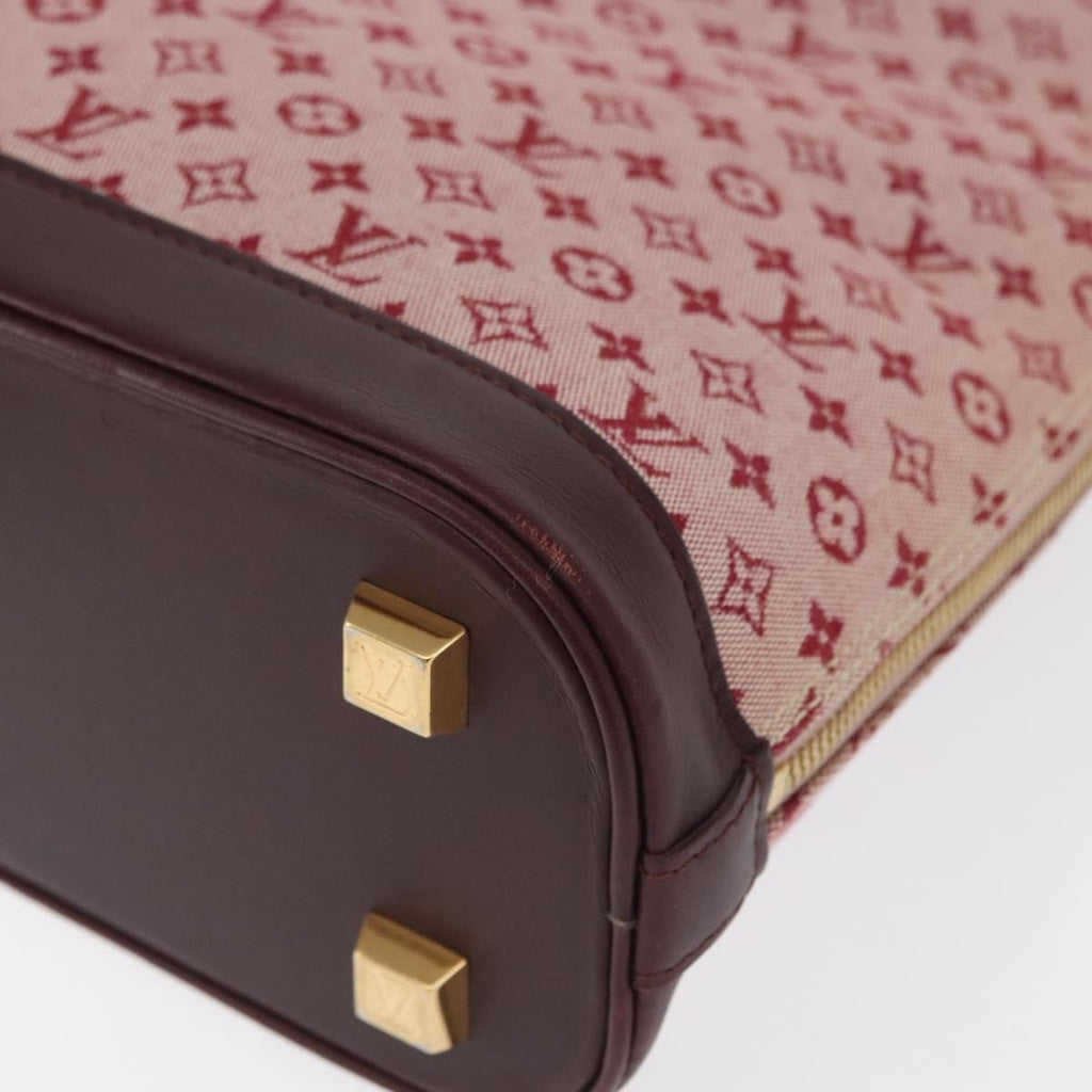 Louis Vuitton Alma Handbag Mini Lin Monogram Red Canvas Handbag (Pre-Owned)