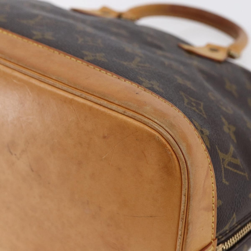 Louis Vuitton Alma Handbag Monogram Canvas Brown Canvas Handbag (Pre-Owned)