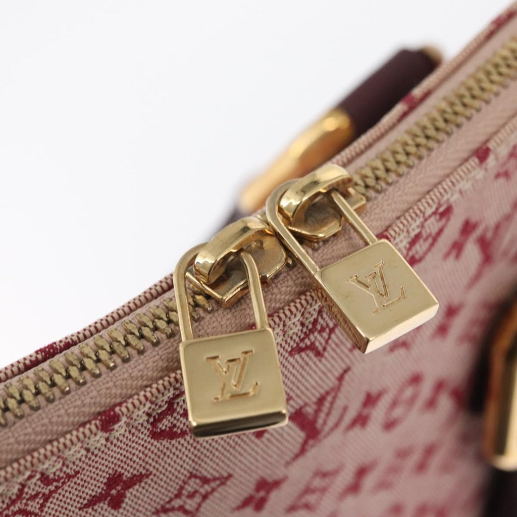 Louis Vuitton Alma Handbag Mini Lin Monogram Red Canvas Handbag (Pre-Owned)