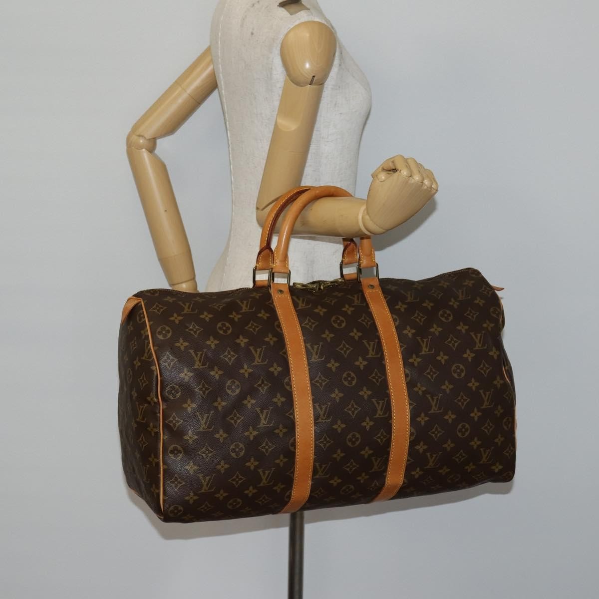 Louis Vuitton Keepall Bag Monogram Canvas Brown Canvas Travel Bag Bag (Pre-Owned)