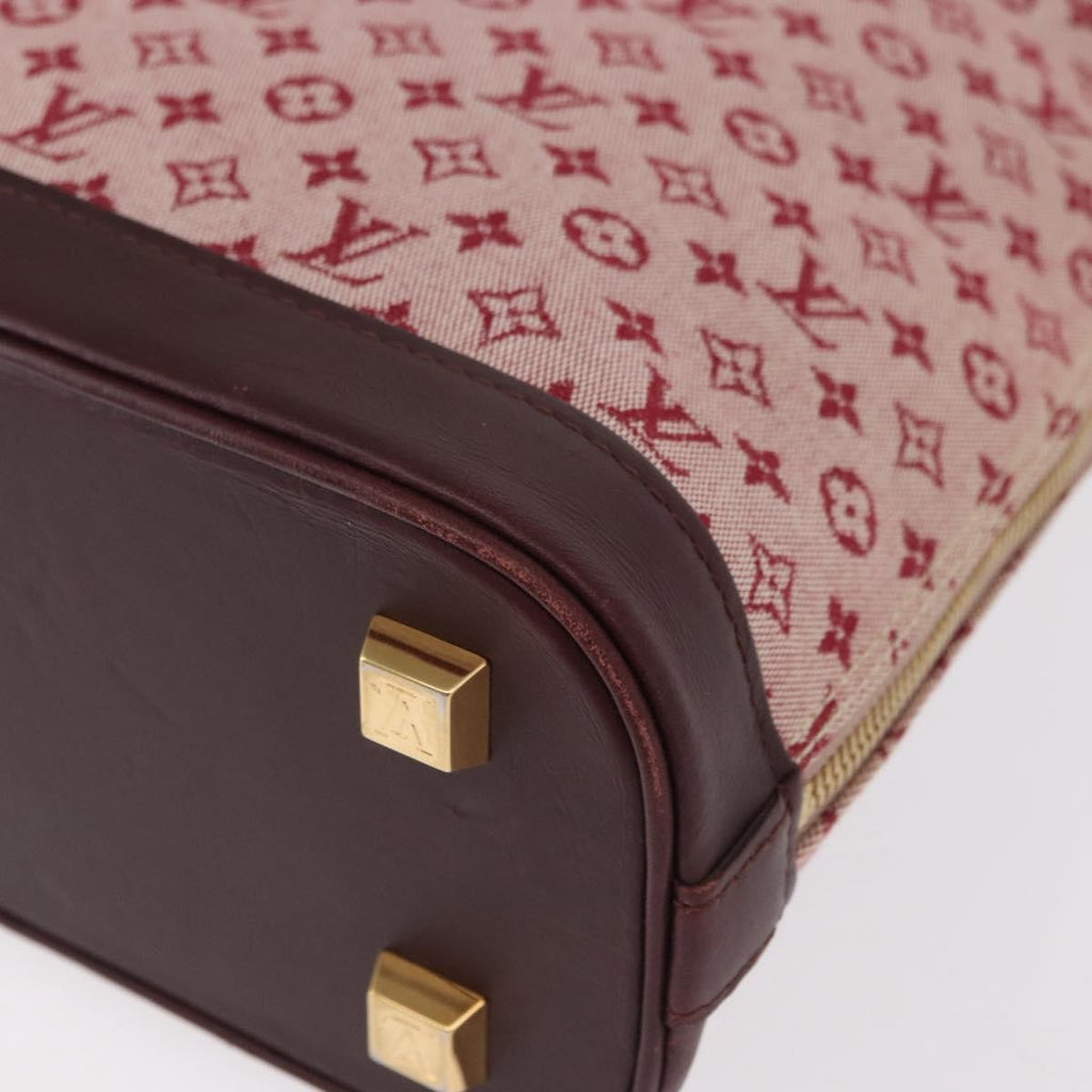 Louis Vuitton Alma Handbag Mini Lin Monogram Red Canvas Handbag (Pre-Owned)